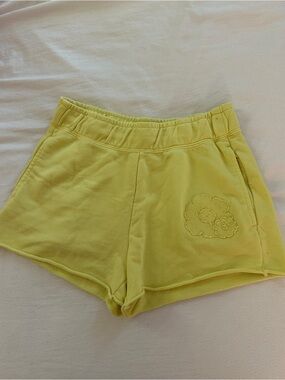 Nike Yellow Women's Athletic Shorts with Floral Embroidered Detail